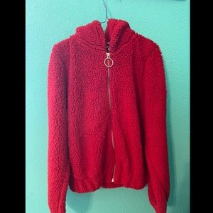 Red fuzzy circle zipper hoodie